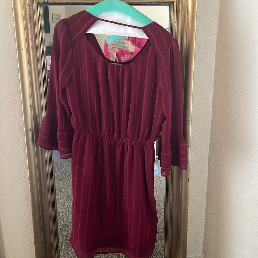 I wore this dress a couple times. It fits so nice and has pockets, which I love - Picture 2 of 3